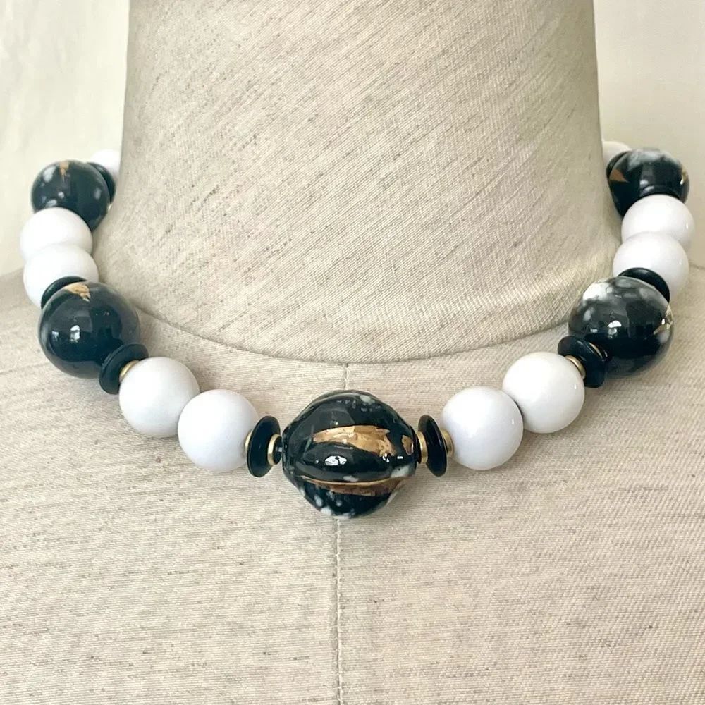 White black and gold tone beaded necklace